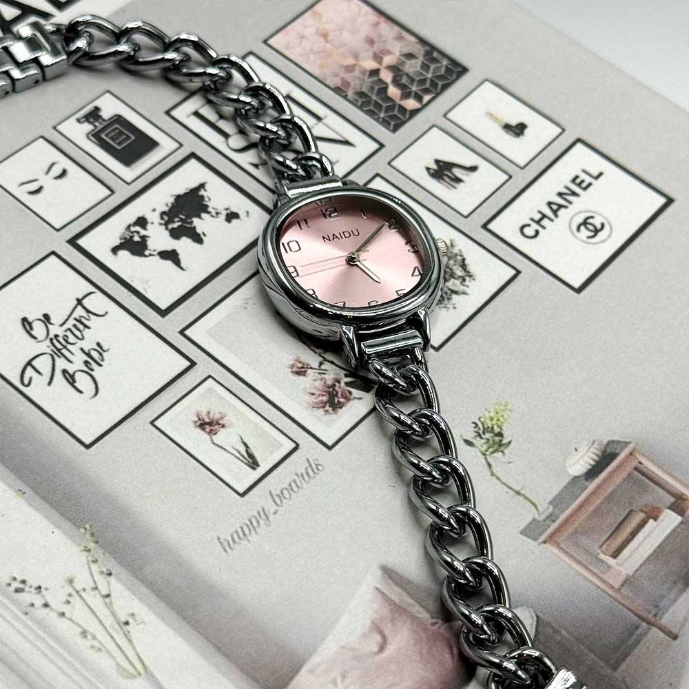 ساعت مچی زنانه نایدو NAIDU بند کارتیر 12 ساعت طرح کارتیر نایدو نقره ای صورتی naidu